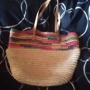 Beautiful leather strap "basket weave" bag.